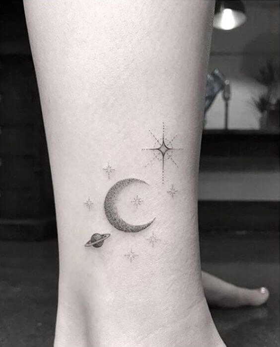 dotwork sun and moon astronomy tattoo ideas on ankle