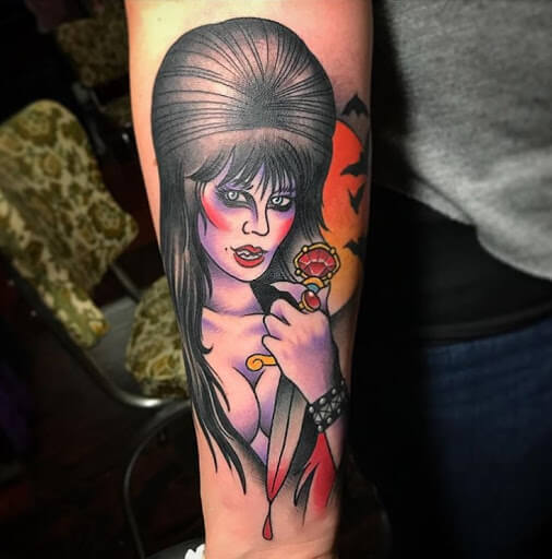 elvira with dagger tattoo