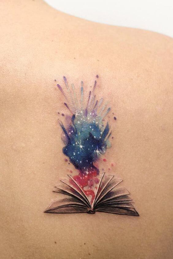 galaxy explosion tattoo on back shoulder blade