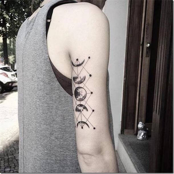 geometric moon phases tattoo design on back of arm