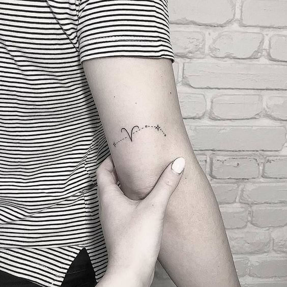 small aries constellation astronomy tattoo on arm