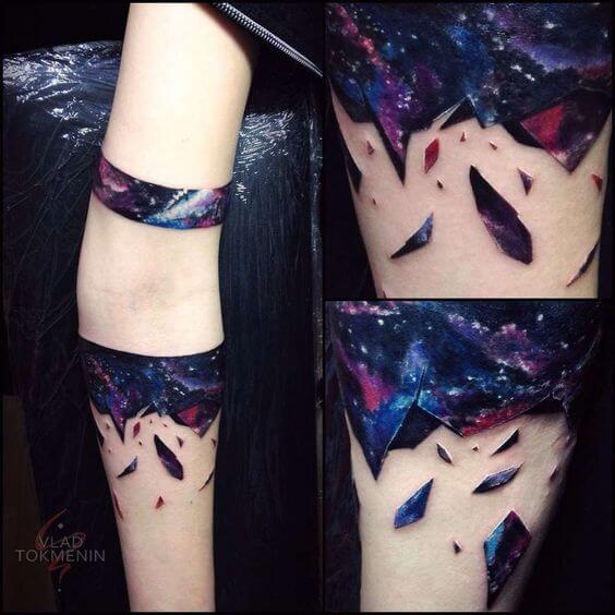 space inspired armband tattoo