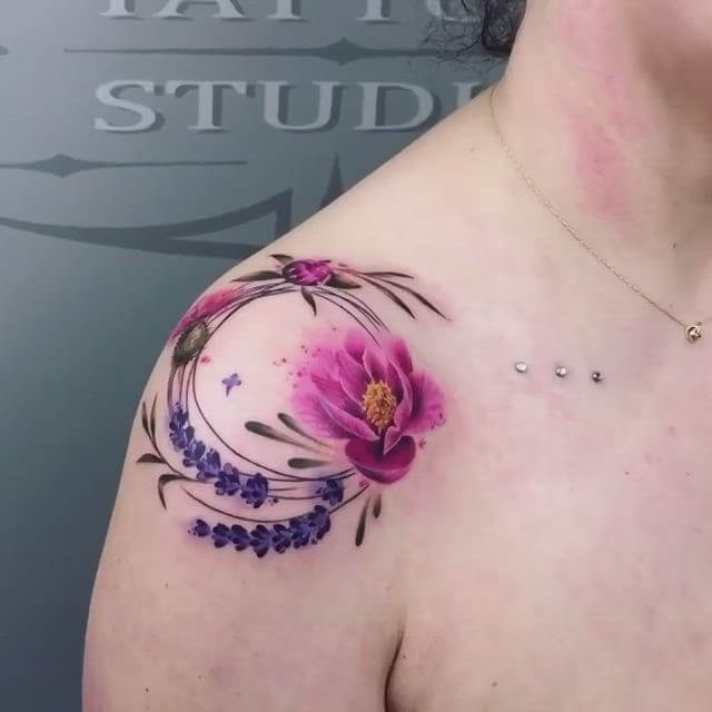 beautiful colored lavender sprig flower tattoo on shoulder