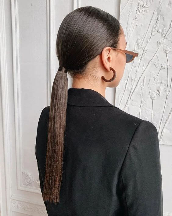 cute easy sleek low pony hairstyle for winter