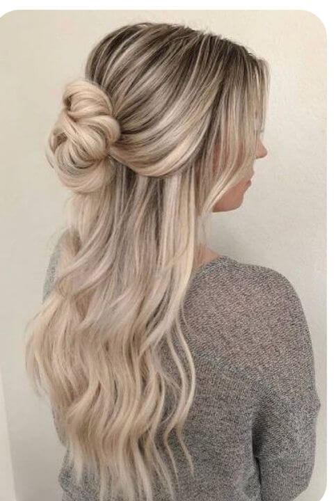 cute half updo with spiral waves hairstyle for winter