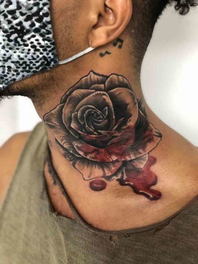 black and grey rose bleeding tattoo design on neck