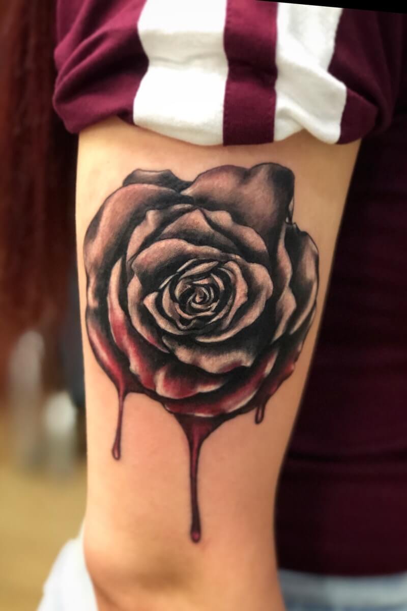 blood dripping black rose petals tattoo design