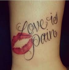 cute love is pain tattoo with red lips