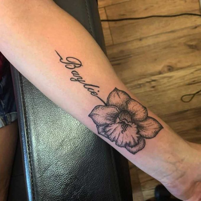 dotwork signature december birth flower narcissus tattoo on forearm