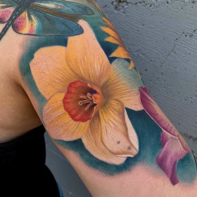 december birth flower narcissus tattoo on full shoulder