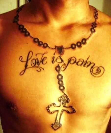rosary cross necklace with quote love is pain tattoo design on chest