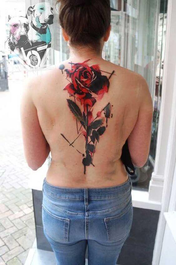 full back bleeding rose tattoo design for women
