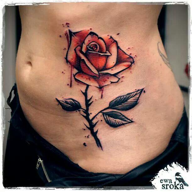 rose with thorns and drops of blood dripping tattoo design on side stomach