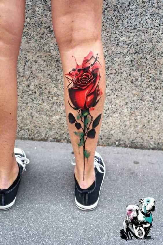 watercolor rose tattoo design on calf