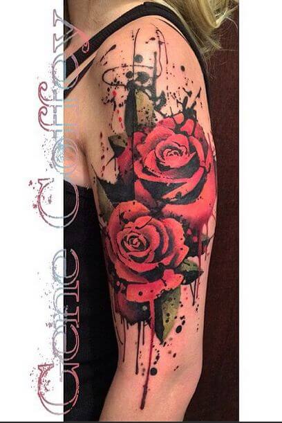watercolor bunch of bleeding roses upper arm tattoo design
