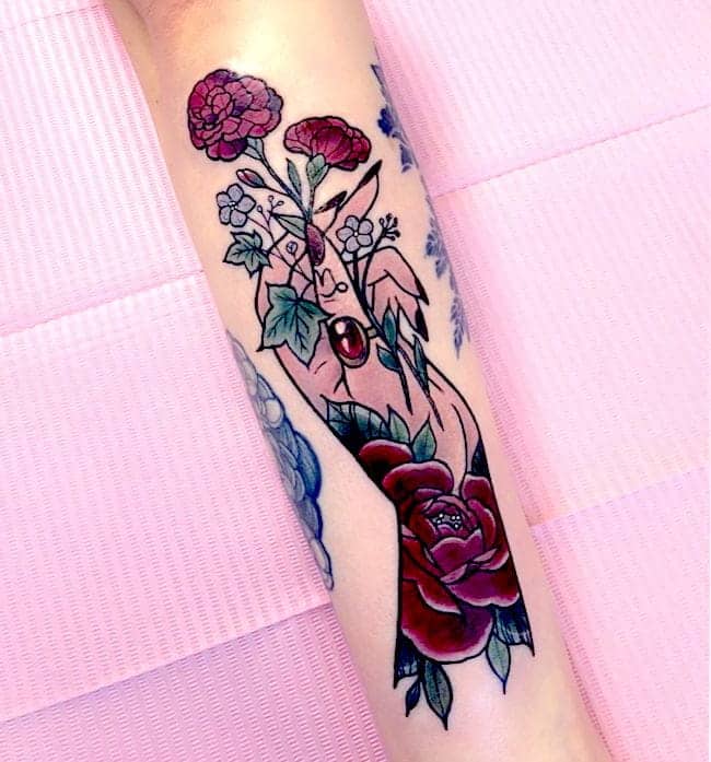 carnation January birth flowers tattoo with female hand