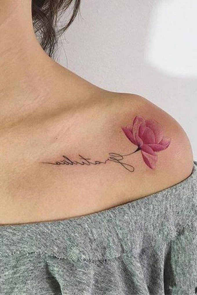 pretty pink carnation January birth flower signature tattoo design on collarbone