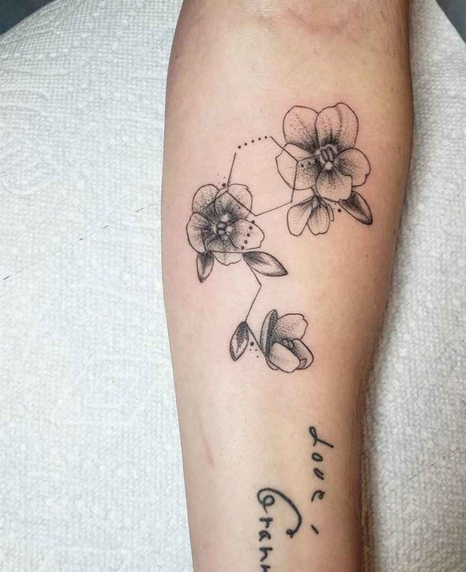 black and white violet flowers making molecules tattoo design on forearm