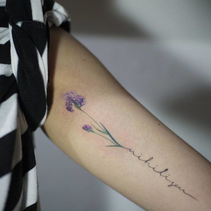 purple iris flower signature tattoo design on forearm