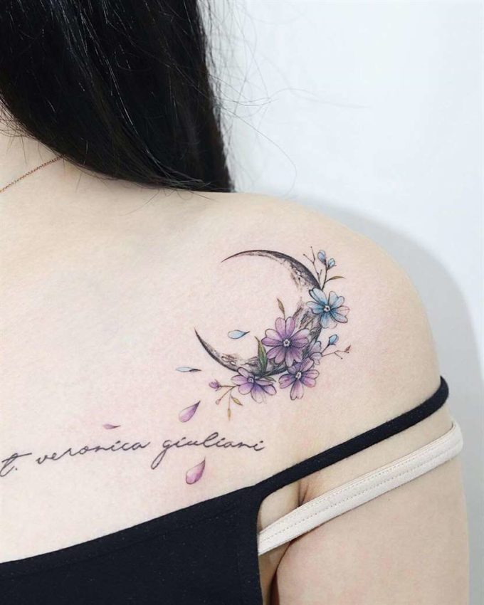 delicate moon with primrose flowers tattoo design on shoulder