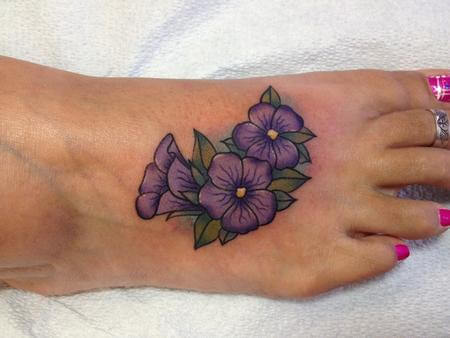 purple violet flowers with leaves tattoo design on foot