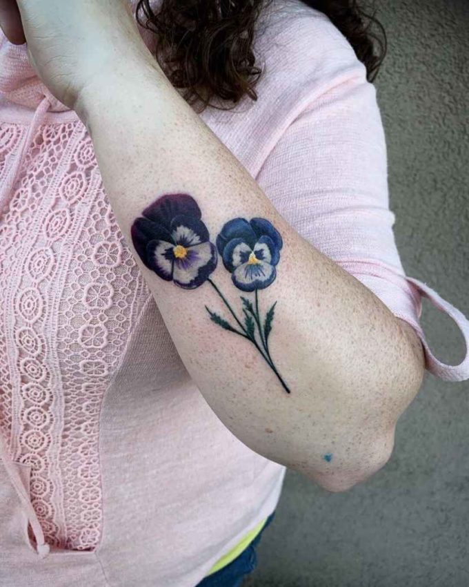 purple and blue violets bud tattoo design on side arm