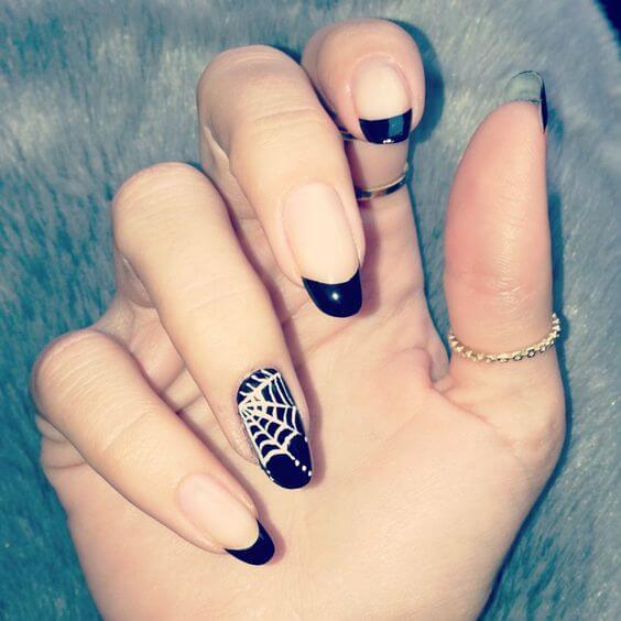 french manicured spider web nail design