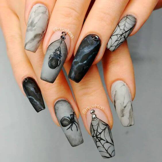 stylish greyish marble effect with spider web nail art design