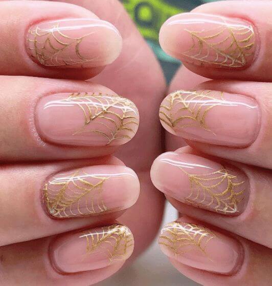 nude beige with golden spider web nail art designs