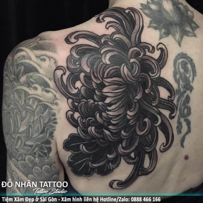 november flower tattoo design on shoulder blade