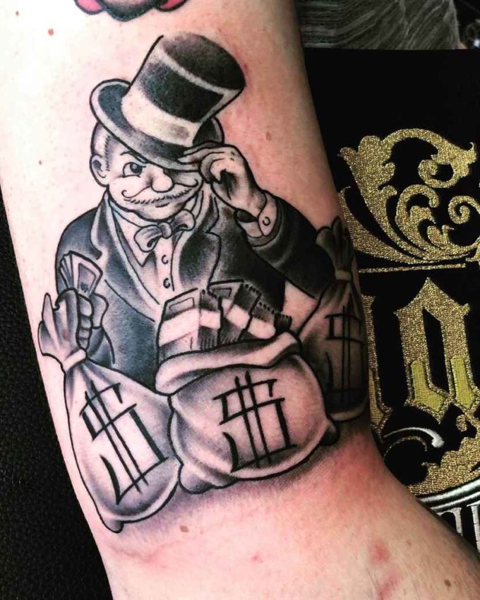 powerful monopoly man with money bags tattoo design
