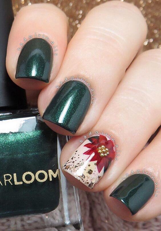 dark green poinsettia nail art idea for christmas newyear holidays