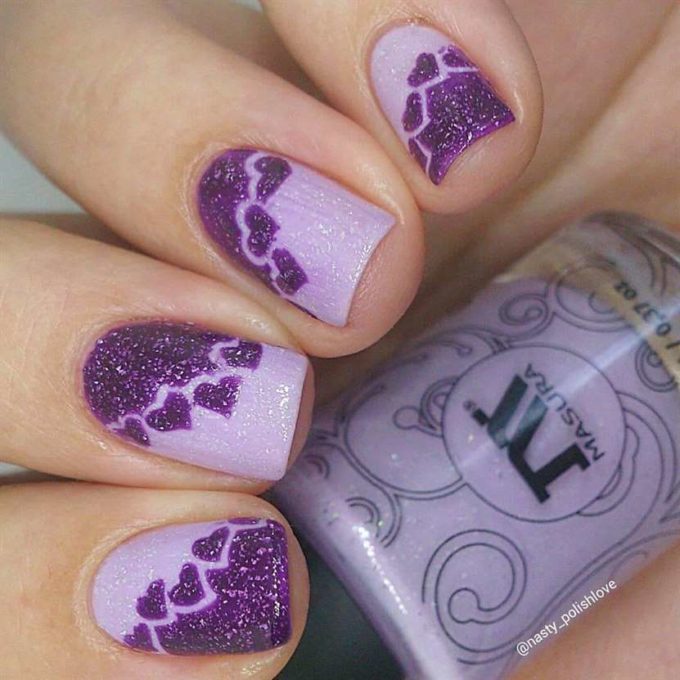 glittery light with dark purple hearts nail art idea for valentines day