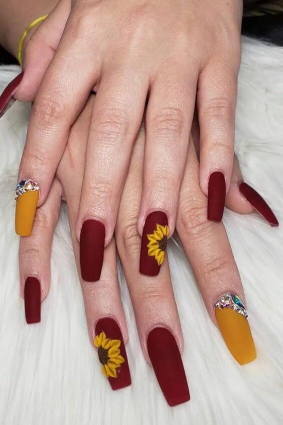 long coffin dark matte maroon and yellow sunflower nails design art 