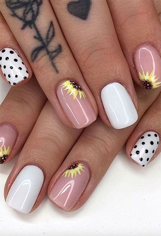 white polka dots and nude with sunflower nails design for summer