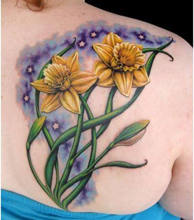 realistic daffodils march birth flower tattoo design idea on shoulder blade