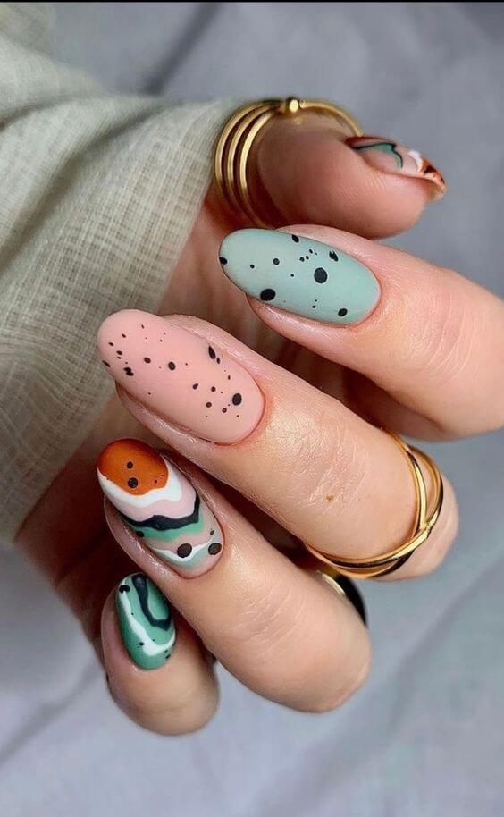 trendy pastel beige and green easter nails art