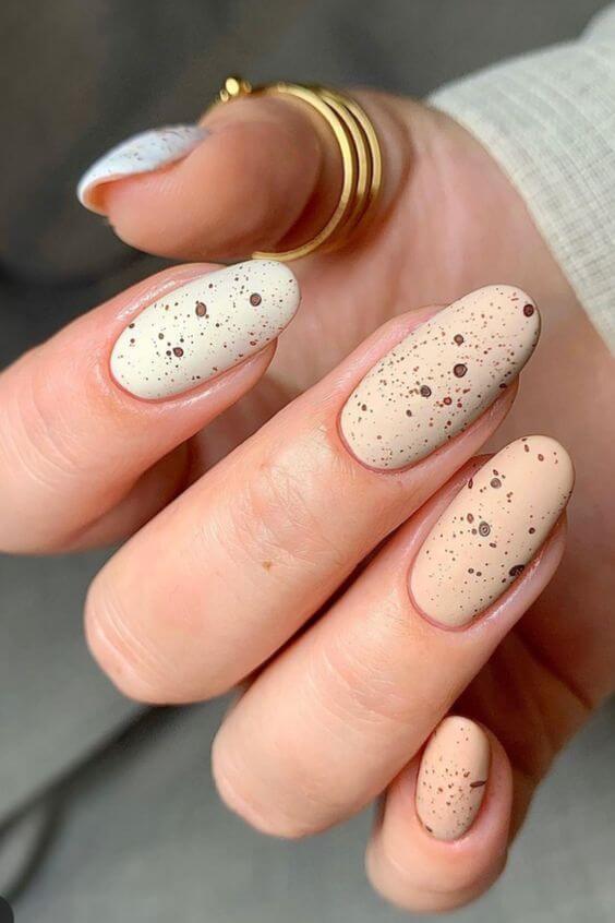 cream and pastel with brown spots easter nail art