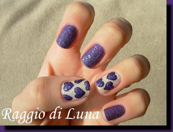 glittery white and purple hearts nail art design idea for valentines day