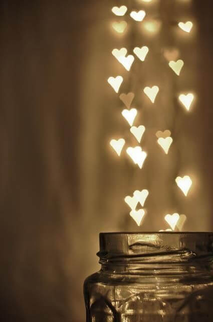 jar with glowing hearts valentines day background image for phone