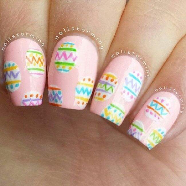 pastel pink easter nails with egg designs