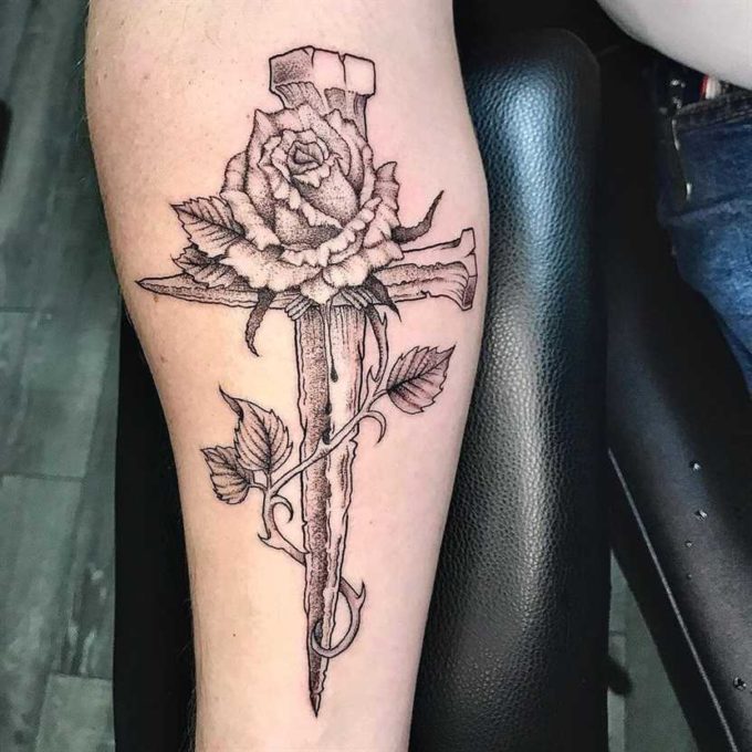 dot work rose vine with cross nail tattoo design