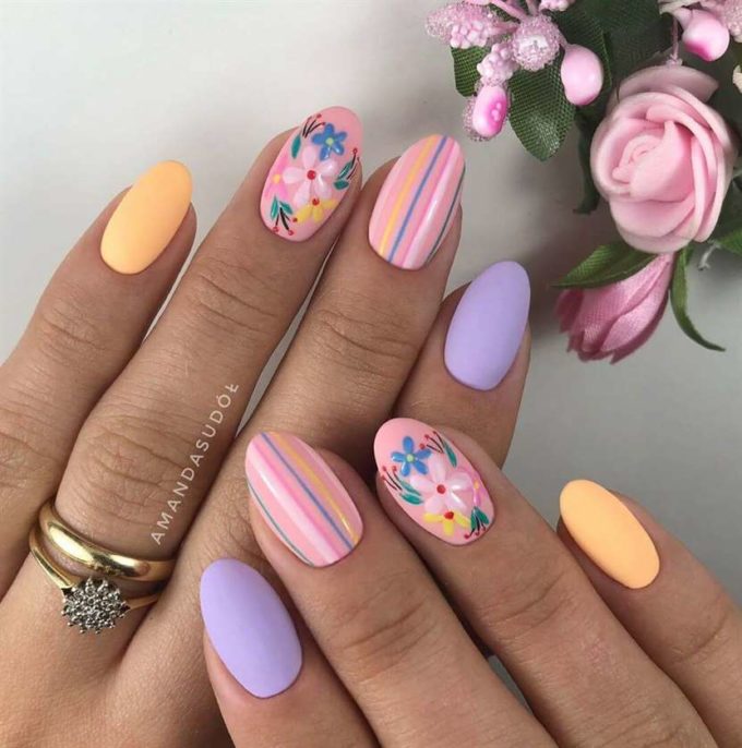 pastel pink yellow and purple short spring nails with lines and flowers designs ideas 2022