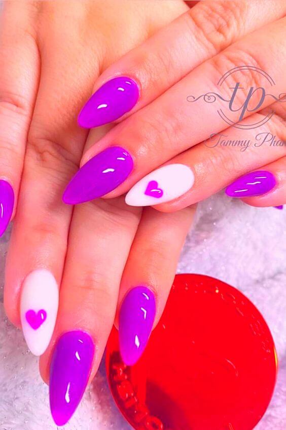 white and glossy magenta almond shaped nails idea for valentines day