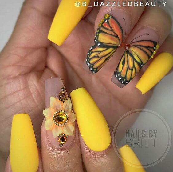 yellow with nude sunflower art and butterfly acrylic coffin nail art design idea for summer