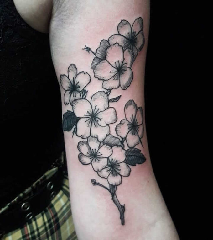 hawthorn may birth flower tattoo design idea on upper arm for females