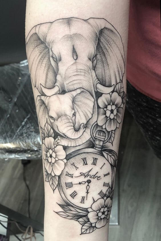 mother elephant with flowers and birth clock tattoo design idea
