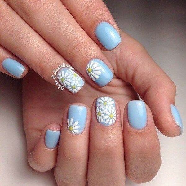 short pastel blue with tiny white flowers nails idea for spring 2022