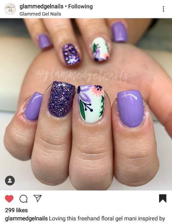 beautifully painted purple with floral print and glitter spring short nails art idea 2022