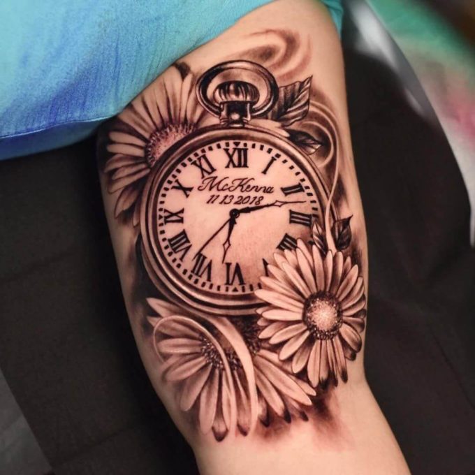 name with date inside roman numeral birth clock and sunflowers 3d tattoo design idea